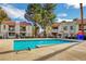 Community pool with surrounding landscaping at 4860 Nara Vista Way # 104, Las Vegas, NV 89103