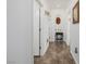 Bright hallway with tile flooring and decorative alcove at 537 Blanche Ct, Henderson, NV 89052