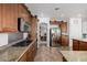 Modern kitchen featuring stainless steel appliances and wood cabinets at 537 Blanche Ct, Henderson, NV 89052