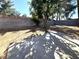 Spacious backyard with large tree and patio at 6211 Bullion Blvd, Las Vegas, NV 89103