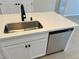 Kitchen island with sink, dishwasher and quartz countertop at 7168 Port Stephens St, North Las Vegas, NV 89084