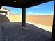 Covered patio with pavers and view of backyard at 7168 Port Stephens St, North Las Vegas, NV 89084