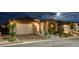 Beautiful home exterior with a two-car garage at 8648 Cloverbelle St, Las Vegas, NV 89166