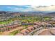 Aerial view of luxury community, showcasing homes with mountain views at 22 Via Vasari # 101, Henderson, NV 89011