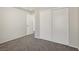 Bright bedroom featuring a large closet and carpet flooring at 4811 Black Bear Rd # 201, Las Vegas, NV 89149