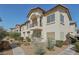 Two-story building exterior with landscaping and walkway at 4811 Black Bear Rd # 201, Las Vegas, NV 89149