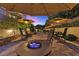 Outdoor patio with fire pit and seating area at 17 Grand Corniche Dr, Henderson, NV 89011