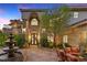 Elegant front courtyard with fountain and seating area at 17 Grand Corniche Dr, Henderson, NV 89011