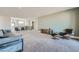 Spacious loft area with comfortable seating and a modern media console at 198 Shaded Canyon Dr, Henderson, NV 89012