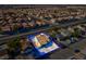 Elevated view of a home with a pool, highlighting its location within a residential neighborhood at 3827 Silent Hill Dr, Las Vegas, NV 89147