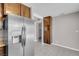 Kitchen with stainless steel refrigerator and ample cabinet space at 3827 Silent Hill Dr, Las Vegas, NV 89147