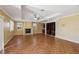 Living room with hardwood floors, fireplace and built-in entertainment center at 8001 Pavarotti Ave, Las Vegas, NV 89178