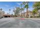 Community center exterior with palm trees and a clock tower at 10025 Netherton Dr, Las Vegas, NV 89134