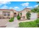 Single-story house with landscaped yard, attached garage, and walkway at 10717 Grand Cypress Ave, Las Vegas, NV 89134