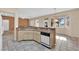 Kitchen with granite countertops and island at 10717 Grand Cypress Ave, Las Vegas, NV 89134