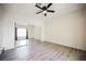 Bedroom with mirrored closet doors and a ceiling fan at 6901 Squaw Mountain Dr # 201, Las Vegas, NV 89130