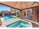 Relaxing backyard oasis featuring a refreshing pool and spa at 8348 Langhorne Creek St, Las Vegas, NV 89139