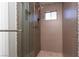 Large walk-in shower with pebble floor and glass enclosure at 5452 Big Sky Ln, Las Vegas, NV 89149