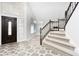 Entryway with tile flooring, staircase and front door at 5452 Big Sky Ln, Las Vegas, NV 89149