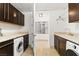 Bright laundry room with modern washer and dryer at 9101 Alta Dr # 1007, Las Vegas, NV 89145