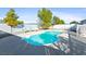 Refreshing kidney-shaped pool in backyard oasis at 2500 S Zephyr Ave, Pahrump, NV 89048