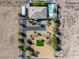 Aerial view of property showing home, pool, and landscaping at 2500 S Zephyr Ave, Pahrump, NV 89048