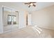 Light and airy bedroom with mirrored closet doors at 2500 S Zephyr Ave, Pahrump, NV 89048