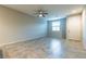 Living room with tile floor and ceiling fan at 2664 Chinaberry Hill St, Laughlin, NV 89029