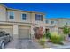 Two-story home with a two-car garage and landscaping at 5269 Silver Branch Ave, Las Vegas, NV 89118