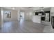 Open concept living space with kitchen and fireplace at 7400 W Flamingo Rd # 2013, Las Vegas, NV 89147