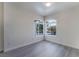 Spacious bedroom with large windows and wood-look floors at 7400 W Flamingo Rd # 2013, Las Vegas, NV 89147