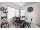 Charming dining room with wood table and four chairs at 3125 Casey Dr # 202, Las Vegas, NV 89120