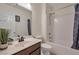 Clean bathroom with a tub, shower, and modern vanity at 3008 Chiefs Ct, North Las Vegas, NV 89032