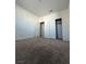 Simple bedroom with carpet flooring and double-door closet at 467 Filaree Pl, Henderson, NV 89015