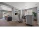 Open concept dining area with a view into the living room at 7171 Willow Moss Ct, Las Vegas, NV 89148