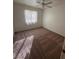 Simple bedroom with carpeted floor and window at 5025 Vista Loma Way, North Las Vegas, NV 89031