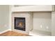 Gas fireplace with stone surround in living room at 6041 Riverwalk Falls St # 102, North Las Vegas, NV 89031