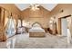 Luxurious main bedroom with marble floors and a fireplace at 2131 Diamond Bar Dr, Las Vegas, NV 89117