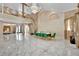 Elegant dining room featuring marble floors and a stunning chandelier at 2131 Diamond Bar Dr, Las Vegas, NV 89117