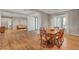 Bright dining room featuring hardwood floors and a traditional wooden table at 4900 N Miller Ln, Las Vegas, NV 89149