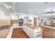 Well-equipped kitchen with island and hardwood floors at 4045 Abernethy Forest Pl, Las Vegas, NV 89141