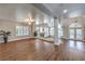 High ceiling living room with hardwood floors and loft view at 4045 Abernethy Forest Pl, Las Vegas, NV 89141