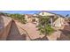 Landscaped backyard with gravel and palm trees at 2133 Desert Woods Dr, Henderson, NV 89012