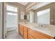 Double vanity bathroom with a separate tub and shower at 1509 Heather Ridge Rd, North Las Vegas, NV 89031