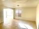 Sunlit dining room with tile floors and arched window at 6 Megan Dr, Henderson, NV 89074