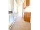 Upper level hallway with carpet, built in storage and railing at 6 Megan Dr, Henderson, NV 89074