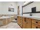 Spa-like bathroom with corner bathtub and walk-in shower at 868 Marina Dr, Boulder City, NV 89005