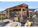 Large covered patio with outdoor kitchen at 868 Marina Dr, Boulder City, NV 89005