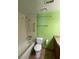 Bright bathroom with a bathtub and toilet at 3823 S Maryland Pkwy # P1, Las Vegas, NV 89119