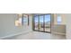 Bedroom with sliding door leading to a balcony and mountain view at 10005 Hematite Pl # 3, Las Vegas, NV 89143